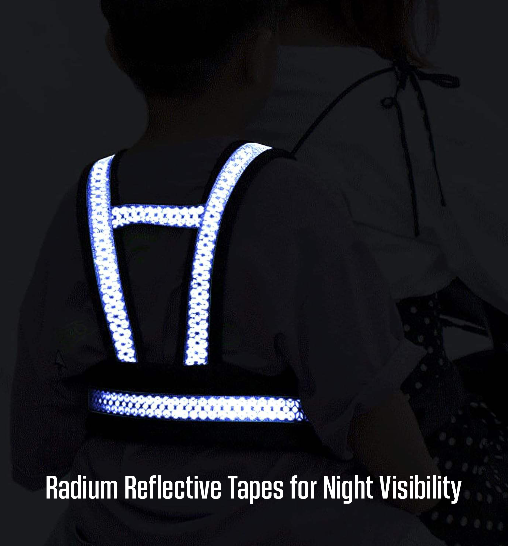 Glowing radium reflective tapes on the child's safety harness enhancing night visibility in the dark.